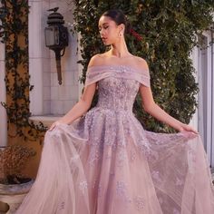 Indulge In Pure Elegance And Captivate All Eyes With Our Stunning English Violet Tulle A-Line Gown. This Breathtaking Gown Features A Delicate Tulle Fabric, A Flattering Off-Shoulder Neckline, Intricate Floral Applique Embellishments, Exquisite Lace Details, And Alluring Elements Like A Removable Sash And A Sleek Zipper Back. Get Ready To Exude Grace And Charm At Any Special Occasion, Leaving A Lasting Impression On Everyone You Meet. Fabric: Tulle Length: Long Color: English Violet Neckline: Of Violet Fantasy Gown, Prom Dresses With Intricate Embroidery On Tulle, Prom Dresses With Intricate Embroidery And Tulle, Intricate Embroidered Tulle Prom Dress, Organza Gala Dress With Intricate Embroidery, Organza Dress With Intricate Embroidery For Gala, Lace Dress With Intricate Embroidery For Debutante Ball, Embroidered Tulle Gown, Floor-length, Embroidered Tulle Floor-length Gown