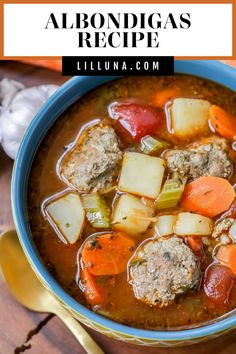 a bowl of soup with meatballs, carrots and celery in it