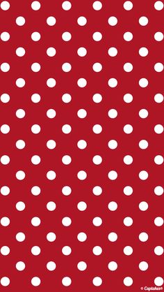 a red background with white polka dots