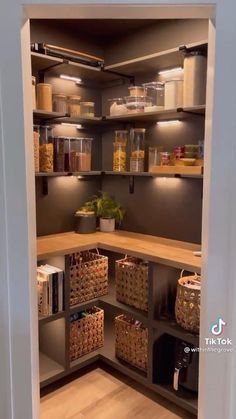 an organized pantry with baskets and food items