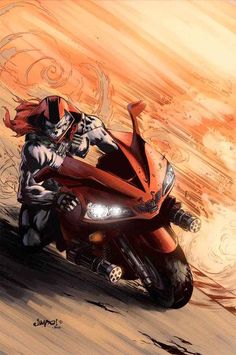 a man riding on the back of a red motorcycle