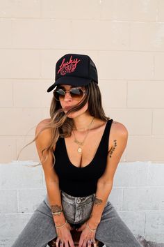 Inspired by VEGAS baby, our Lucky Roll trucker hat features hand drawn lettering and dice illustration. We love Vegas for food, occasional luck at the tables, pool days and visits to grandma! This black trucker hat features an adjustable snapback, mesh backing and foam front! Size: One size fits most Material: 100% Polyester Made in Myanmar + USA Designed in Ventura, CA Casual Black Hat For Music Festival, Black Trucker Hat For Summer, Black Trucker Hat With Graphic Print, Black Graphic Print Trucker Hat, Black Baseball Cap For Music Festival, Trendy Summer Trucker Hat With Graphic Print, Trendy Graphic Print Trucker Hat For Summer, Trendy Black Hat For Music Festival, Fun Black Trucker Hat With Letter Print