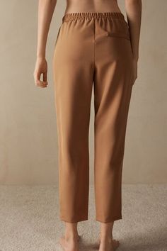 Full-length trousers featuring two pockets, faux back pocket and covered elasticated waist. Business Casual Straight Dress Pants With Pull-on Style, Straight Hem Pants With Elastic Waistband For Work, Workwear Pants With Elastic Waistband And Straight Hem, Brown Ankle-length Pants With Elastic Waistband, Classic Pants With Elastic Waistband, Straight Pants With Pull-on Style For Work, Workwear Straight Pants With Pull-on Style, Brown Trousers With Side Pockets, Bottoms With Pull-on Style And Straight Hem For Workwear