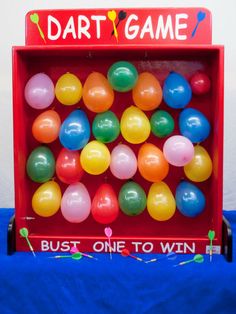 an old fashioned candy game with lots of gummy balls in the front and on the back