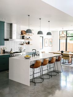 an instagram photo of a kitchen and dining room