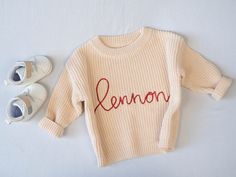 Custom handlettered embroidery on 100% cotton chunky knit sweater. These sweaters are so comfy and perfect for babies and toddlers.  And with so many color options you can find the perfect color combination.  The best baby shower or sibling gift. A forever keepsake!  Additional sizes available through custom order. Please message me for details.  *Please note that we are limited to one name per sweater and all letters will be lowercase.  Actual colors may vary.   This is due to computer monitors Baby Jumpers, Pull Bebe, Sibling Gifts, Chunky Knit Sweater, Chunky Knits Sweater, Baby Sweaters, Hand Lettered, Computer Monitors, Gender Neutral Baby