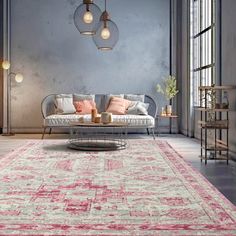 a living room filled with furniture and a large rug