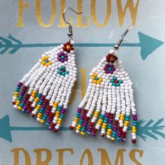 two pairs of beaded earrings with colorful beads on the front and back of them