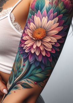 a woman's arm with flowers and leaves painted on the back of her body