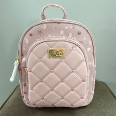 Betsey Johnson Rosey Tonal Quilt/Dot Combo Quilted Backpack A Quilted Front Pocket Adds Contrast To This Sized-Right Backpack With Colorful Ombr Hues. 8.3"H X 7.5"W X 4.5"D Top Zip Closure Pvc. Color: Rosey Tonal Quilt/ Dot Combo Cute Bags With Zipper Closure, Everyday Pink Bags, Emoji Backpack, Baseball Backpack, Owl Backpack, Unicorn Hoodie, Skull Bags, Quilted Backpack, Dog Backpack