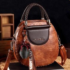 Round shaped Soft Leather Handbag model produced in brown tone as main theme color has fine details that you would like to have. Soft leather handbag by rounded design is very elegant. Classy Handbags, Leather School Backpack, Mobile Bag, Soft Leather Handbags, Small Shoulder Bag, Beautiful Bags, Bago, Sling Bag