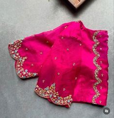 Hand embroidered ready made saree blouse / crop top/stitched saree blouse usa / saree blouse/modern blouse/zardosi blouse/black saree blouse/ pure silk blouse/ maggam work blouse / pink saree blouse / modern pink elbow sleeve blouse       It is very true that a perfect blouse is the one which makes your saree look stand out !! If you find one of such a style that you have been wanting to have then dont let it go !! we carry such unique trending blouses that instantly add a stylish look to any saree !!     Well..!! we understand that you may not get in your desired size/pattern, here you go with customization according to your size/pattern which we can deliver in 1-2 weeks of time period !!      Here is a beautiful Hand embroidered zardosi work saree blouse/ crop top  in hot pink color that Black Maggam Blouse, Venkatagiri Pattu Sarees Blouses Designs, Saree Blouse Modern, Zardosi Blouse, Embroidery Blouse Saree, Black Saree Blouse, Hand Embroidery Blouse, Pink Saree Blouse, Ready Made Blouse