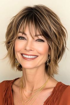 Save this pin for the best short layered haircuts with bangs. This sassy, short layered haircut combines an edgy texture with a flattering shape. The choppy layers create movement and volume, while the highlights really define those layers. Edgy Razor Haircuts, Layered And Textured Haircuts, Sassy Layered Haircuts, Cute Short Haircut With Bangs, Long Stacked Bob Haircut Shoulder Length Medium Layered, Medium Length Hair With Textured Layers, Short Length Layered Haircuts, Short To Medium Hair With Bangs, Short Choppy Hair Styles