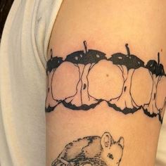 a tattoo with an image of mice on it