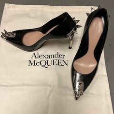 Alexander Mcqueen Black Leather High Heels With Silver Hardware Size 38, 4” Heel Alexander Mcqueen Aesthetic, Alex Mcqueen, Givenchy Heels, Alexander Mcqueen Runway, Alexander Mcqueen Boots, Shoes Alexander Mcqueen, Black Alexander Mcqueen, Mcqueen Shoes, Alexander Mcqueen Clothing