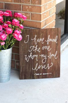 a wooden sign that says i hope found the one whom my soul loves