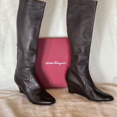 Salvatore Ferragamo. Made In Italy. Dark Brown Wedge Boot. Excellent Condition. Worn Once. Size 8 1/2 B Heel 3 1/2”. Shaft 15 3/4” Style Naissa Retail $950. $250 Brown Wedge Boots, Salvatore Ferragamo Shoes, Ferragamo Shoes, Shoes Heels Boots, Salvatore Ferragamo, Wedge Boot, Shoes Women Heels, Heeled Boots, Dark Brown