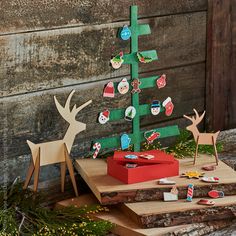 a christmas tree made out of cardboard and paper