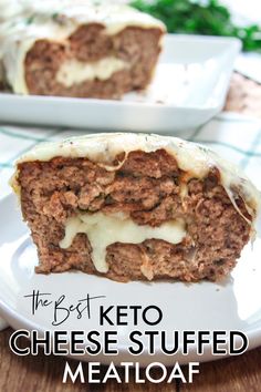 the meatloaf is cut in half and ready to be eaten with cheese - stuffed meat