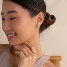 Discover our Ericka Geometric Tennis Huggies, featuring a delicate Art Deco design with round diamond gemstones set in a bezel. These unique earrings combine classic sparkle with a modern geometric twist, making them a standout accessory ✨ SKU: RR-ER489 Product Details Material: High Quality Solid 925 Sterling Silver Finish: 18K Gold ∙ Sterling Silver Hoop Dimensions: ~8 Inner Diameter | ~12mm Outer Diameter Featuring dainty Huggie Hoop Earrings with ~1.5mm Diamond CZ Gemstone embedded in ~5x3mm Modern Twist Earrings For Everyday Wear, Modern Twist Huggie Earrings As Gift, Modern Twist Huggie Earrings For Gifts, Modern Twist Round Earrings For Everyday, Modern Twist Huggie Jewelry Gift, Elegant Adjustable Huggie Earrings For Anniversary, Modern Tarnish Resistant Diamond Earrings For Anniversary, Modern Tarnish-resistant Diamond Earrings For Anniversary, Modern Twist Matching Drop Earrings