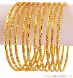 22k Machine Bangles Set (10PC) - BaGo16641 - US$ 6,932 - 22K yellow gold bangles set(10 Pcs), beautifully designed with machine cuts and Diamond cuts. Machin Gold Bangles Set, Gold Bangles For Women, Gold Bangle Set, Antique Gold Jewelry Indian, Gold Jewelry Simple Necklace, The Bangles, Bangles Set, Bracelets Design, Yellow Gold Bangle