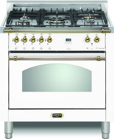 a white stove top oven sitting on top of a metal countertop with gold trimmings