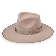 The traditional fedora silhouette gets a modern update with trendy boho-chic styling. The soft felt finish makes it perfect for year-round wear. UPF 50+ fabric blocks 97.5% of ultraviolet rays, according to the Australian Radiation Protection Agency 3¾" brim Packing not recommended Crown size: M (58cm) Wind-resistant adjustable sizing 100% soft brushed wool felt exclusive of trim Spot clean only Wallaroo hats do not feature a built-in magnet for emblems. For hats with magnetic emblems, please pu Wallaroo Hats, Womens Wide Brim Hats, Fabric Blocks, Womens Fedora, Mens Sun Hats, Radiation Protection, Felt Fedora, Hat For Men, Crown Design