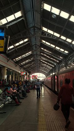 people are waiting for the train to arrive