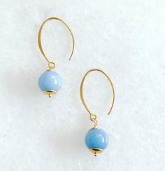 Elegant aquamarine earrings  Gold sterling silver and aquamarine Elegant Light Blue Hypoallergenic Earrings, Aquamarine Drop Earrings With Ear Wire, Light Blue Topaz Gemstone Earrings, Light Blue Blue Topaz Gemstone Earrings, Gold Aquamarine Gemstone Earrings, Elegant Aquamarine Earrings With Ear Wire, Light Blue Gemstone Round Earrings, Light Blue Hypoallergenic Drop Earrings, Hypoallergenic Light Blue Drop Earrings