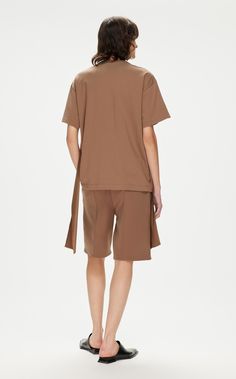 Fabric: 100% Cotton Brown Short Sleeve T-shirt For Work, Summer Cotton Tops With Tassels, Fall Cotton Tops With Tassels, Cotton Tops With Tassels For Fall, Brown Crew Neck T-shirt For Work, Casual Short Sleeve Tops With Tassels, Summer Short Sleeve Tops With Tassels, Summer Tassel Short Sleeve Tops, Short Sleeve Cotton Blouse With Tassels