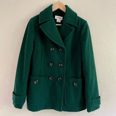 This is a great quality classic Peacoat.  A thick wool blend perfect for Winter, in a lovely dark Forest Green.  Women's Size M. Classic Green Wool Coat, Classic Green Double-breasted Pea Coat, Green Pea Coat With Button Closure For Fall, Green Pea Coat For Fall With Button Closure, Classic Green Winter Outerwear, Vintage Peacoat For Fall Workwear, Classic Wool Coat For Fall, Classic Green Pea Coat With Button Closure, Green Pea Coat With Double Button Closure For Fall