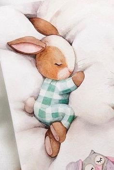 a painting of a bunny sleeping in bed with its eyes closed and head on the pillow