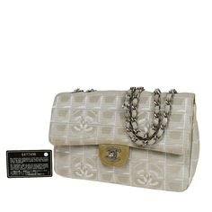 CHANEL Travel line HandbagBrand: Chanel Model: Travel line Color: Beige Material: Canvas Comes with: card Dimensions: W?ÿ 25 x H 17 x D 6 Serial number: 64774 Country of origin: France Chanel Style, Chanel Model, Canvas Shoulder Bag, Chain Shoulder Bag, New Bag, Wallet Case, Timeless Pieces, Luxury Bags, Fashion Bags