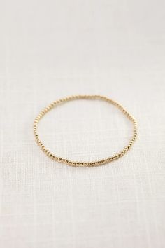 We love all things gold! Keep it simple and wear it alone or have some fun by stacking multiple bracelets together. 3mm Gold-filled causes the layers of karat gold to bond to high-quality metal to maintain superior quality One size Stretch-fit Multiple Bracelets, Keep It Simple, Have Some Fun, Bead Bracelet, Wear It, Womens Bracelets, Some Fun, Sale Items, Gold Filled