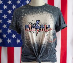 A great shirt for mom to show off on 4th of July! Sizes go up to 5X All shirts are unisex and fit true to size. It is 50/50 cotton to polyester with a cotton feel. Note: No two bleached shirts can look exactly the same however they will look very similar. Patriotic Short Sleeve Top With Custom Print, Patriotic Relaxed Fit Shirt For Spring, Patriotic Tops With Independence Day Custom Print, Patriotic Tops With Independence Day Print, Patriotic Tops With Custom Print For 4th Of July, Independence Day Patriotic Tops With Custom Print, Patriotic Tops With Custom Print For Independence Day, Bleached Shirt, Patriotic Tees