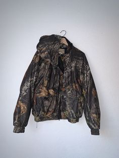 Vintage Woolrich Woolen Mills Camo Bomber Hooded Jacket sz L. Vintage Hooded Hunting Outerwear, Vintage Hooded Outerwear For Hunting, Fall Hunting Hooded Jacket, Vintage Hooded Windbreaker With Drawstring, Vintage Windbreaker With Drawstring Hood, Vintage Camouflage Outerwear For Outdoor, Vintage Hooded Jacket With Double-lined Hood For Outdoors, Vintage Hooded Jacket With Double-lined Hood For Outdoor Activities, Vintage Hooded Jacket With Adjustable Hood For Outdoor