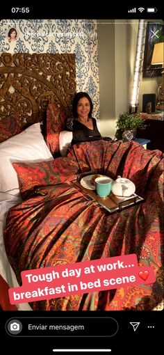 a woman laying in bed with a tray of breakfast on her lap and the caption reads tough day at work breakfast in bed scene