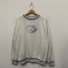 >> Vintage Rancho Park LA Sweatshirt ** Size on tag : Medium ** Measurement on laid flat :  >> Armpit : 22" >> Shoulder to bottom : 26" >> Length sleeve from collar : 28" ** Good used condition. ** Small stains at front and sleeve. ** Overall condition is 8/10. ** Weight : 435g #SW-25 Sporty White Sweater With Embroidered Logo, Sporty Crew Neck Sweater With Embroidered Logo, Casual White Sweater With Embroidered Logo, Retro White Crew Neck Sweatshirt, White Graphic Print Sweater For Sports Season, White Crew Neck Sweater For Sportswear, White Crew Neck Sweater In Sportswear Style, White Crew Neck Sweatshirt Sportswear, Casual Crew Neck Sweater