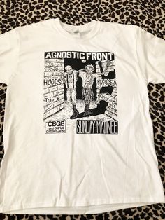 Agnostic Front Vintage Flyer T-Shirt. Artwork taken from a vintage show flyer that took place at CBGB's in New York during the mid 1980's with Nausea and NY Hoods. Hand screened on a White 100% Cotton Tee. Vintage Flyer, Show Flyer, Van Nuys, High Fashion Outfits, Mens T Shirts, Fitness Inspo, Vintage Shirts, Cotton Tee, Mens T