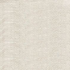 an upholstered white background with herringbones