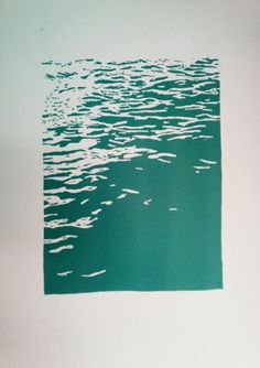 an image of the water that is blue and green with some white lines on it