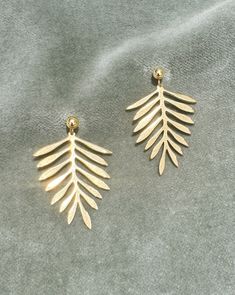 Fern leaves are made of raw brass. Gold plated stainless steel studs. Leaf size: 2,5 x 3 cm Yellow Gold Leaf-shaped Brass Earrings, Metal Leaf Shaped Earrings, Metal Leaf-shaped Pierced Earrings, Pierced Leaf-shaped Metal Earrings, Gold Plated Leaf-shaped Earrings, Gold Leaf-shaped Nickel-free Earrings, Silver Leaf-shaped Brass Earrings, Gold Leaf Shaped Metal Jewelry, Minimalist Gold Leaf Earrings