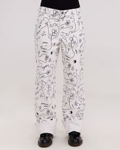 Scribble Carpenter Pants | By Samii Ryan Trendy Cotton Bottoms With All Over Print, Wide Leg Pants With Graphic Print In Relaxed Fit, Baggy Cotton Pants With Graphic Print, White Wide Leg Pants With Graphic Print, Cotton Wide Leg Pants With Graphic Print, Wide Leg Cotton Pants With Graphic Print, Spring Streetwear Bottoms With All Over Print, Artistic Cotton Bottoms With Graphic Print, Printed Cotton Bottoms For Streetwear