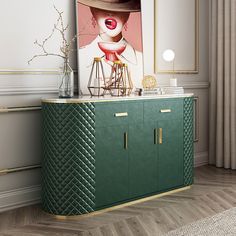 a green cabinet with a painting on the wall