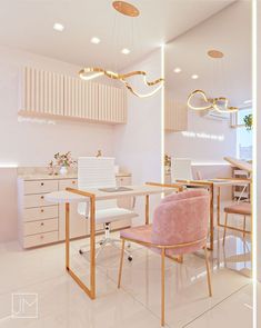 an office with pink chairs and white desks in the center, along with hanging lights