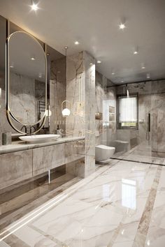 a large bathroom with marble floors and walls