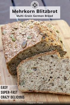 a loaf of bread sitting on top of a wooden cutting board