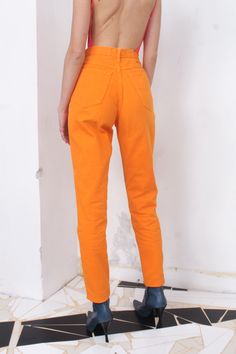 "vintage 90s bright orange high waist jeans> five pockets label> h&j \\ holiday&jeans material> cotton size> 46\\32 waist> 74cm\\ 29'' hips> 102cm\\ 40'' length> 103cm\\ 40'' inseam> 28cm\\ 11\" condition> great vintage condition> minimal wear | model is 174 cm [5'8\"] and measures 80-56-90 cm [31\"-22\"-35\"] |" Orange Straight Leg Summer Bottoms, Orange Straight Leg Bottoms For Summer, Retro High Waist Orange Pants, Retro High-waisted Orange Pants, Retro Orange High-waisted Pants, Retro Orange High-waisted Bottoms, Retro Orange Bottoms With Pockets, Orange Straight Leg Cotton Pants, Vintage Orange Bottoms For Spring