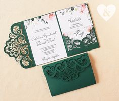 two green and white wedding cards on top of each other next to a pink flower