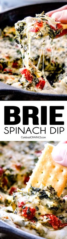 spinach dip being lifted from a baking dish with crackers in the foreground